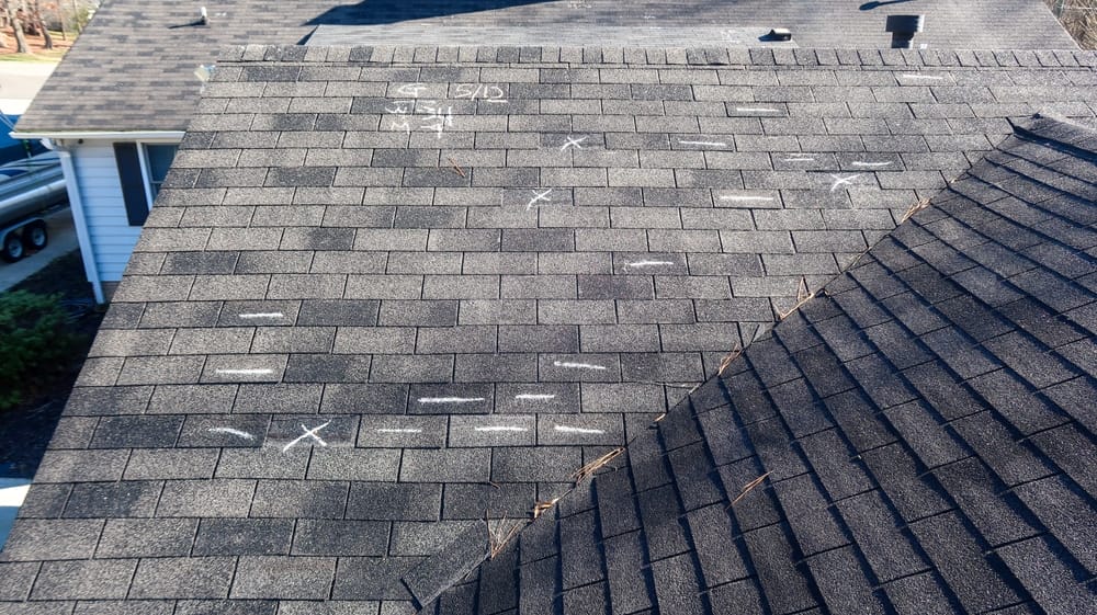 Residential roof inspection for an insurance claim due to storm damage.