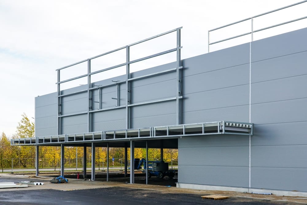 unfinished,metal,frame,warehouse,building,facade,covered,with,thermally,insulated