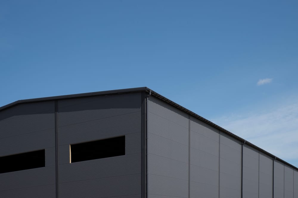 industrial,metal,panel,building,facade,under,blue,sky